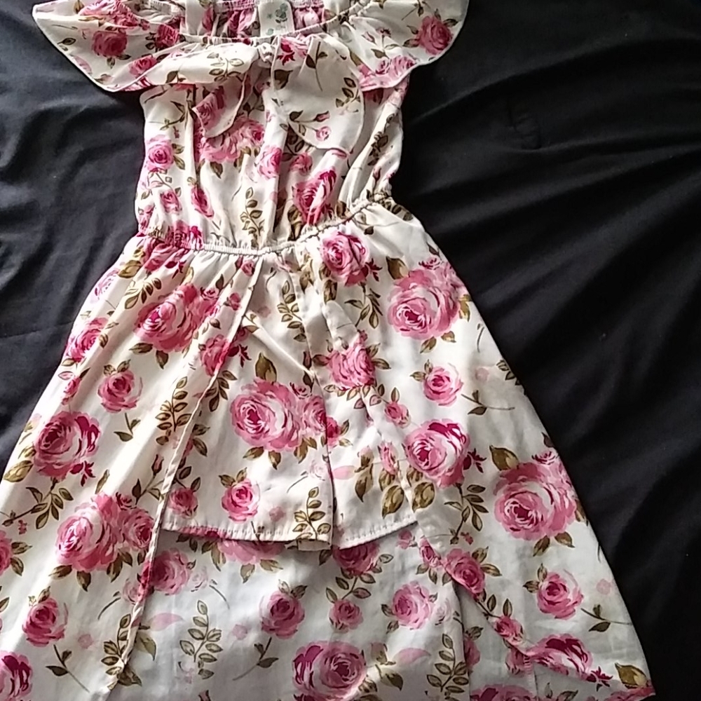 Flowered dress with shorts.
